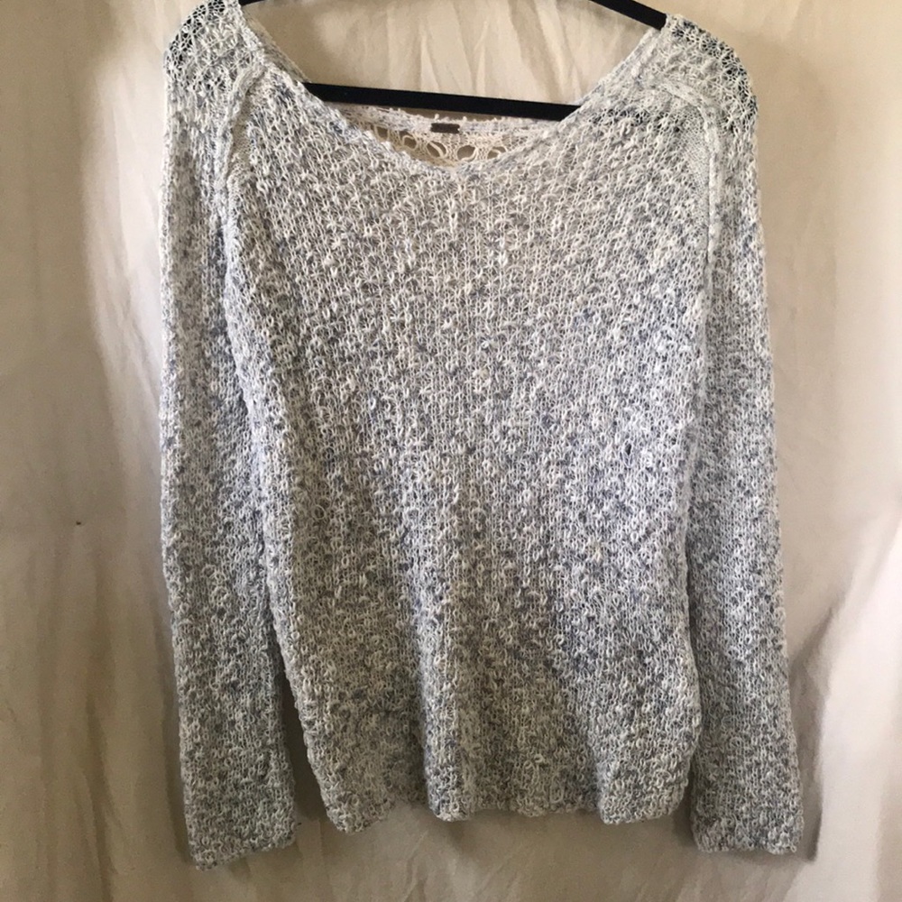 Light weight sweater.   Lace back.